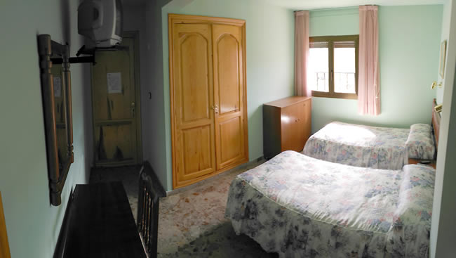Habitación doble con camas separadas en Casa rural martina
